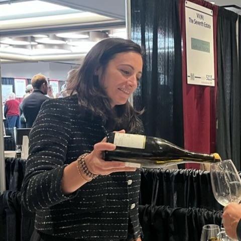 Marion Tricoire pouring wine